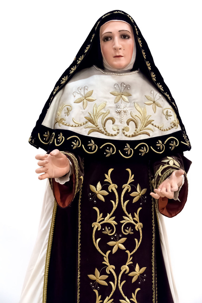Nun in ornate habit