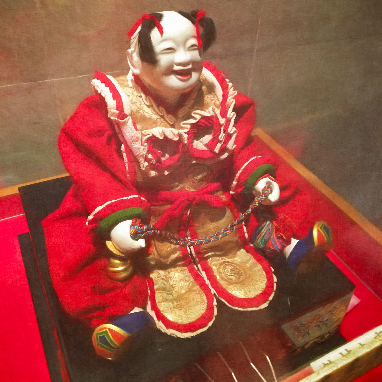 Seated puppet